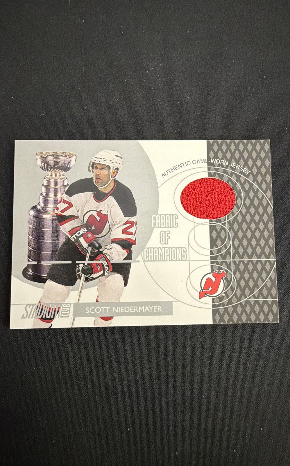 2002-03 Topps Stadium Club - Fabric of Champions Scott Niedermayer #FC-7 (MEM)