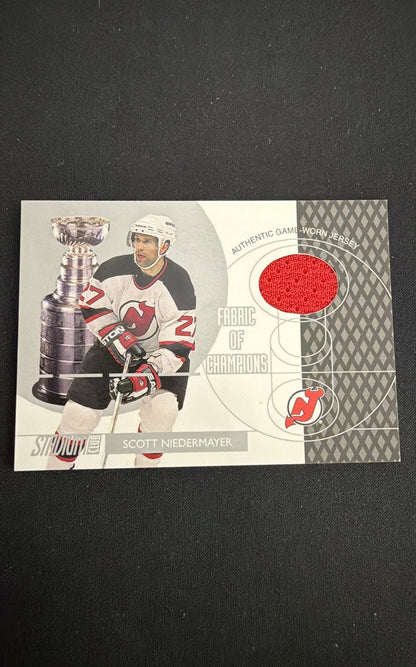 2002-03 Topps Stadium Club - Fabric of Champions Scott Niedermayer #FC-7 (MEM)