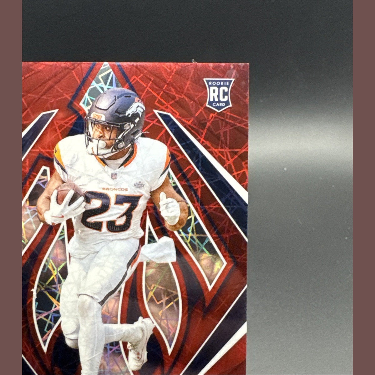 2024 Panini Phoenix Audric Estime Red Lazer #156 Denver Broncos RC /199