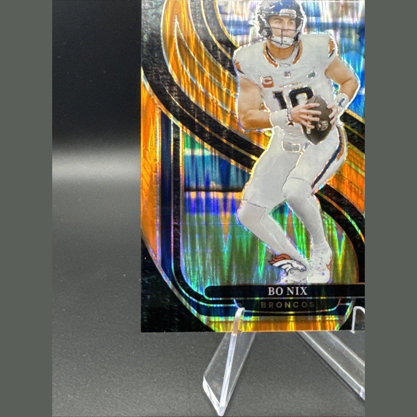 2024 Panini Select Premier Level Bo Nix #117 Orange Shock Prizm /399 (RC)