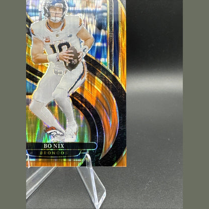 2024 Panini Select Premier Level Bo Nix #117 Orange Shock Prizm /399 (RC)