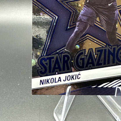 2024-25 Panini Revolution Star Gazing Nikola Jokić #7 Blue Astro 124/285