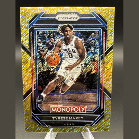 2022-23 Panini Prizm Monopoly Tyrese Maxey #69 Gold Money Shimmer Prizm