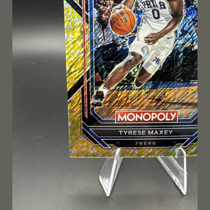 2022-23 Panini Prizm Monopoly Tyrese Maxey #69 Gold Money Shimmer Prizm