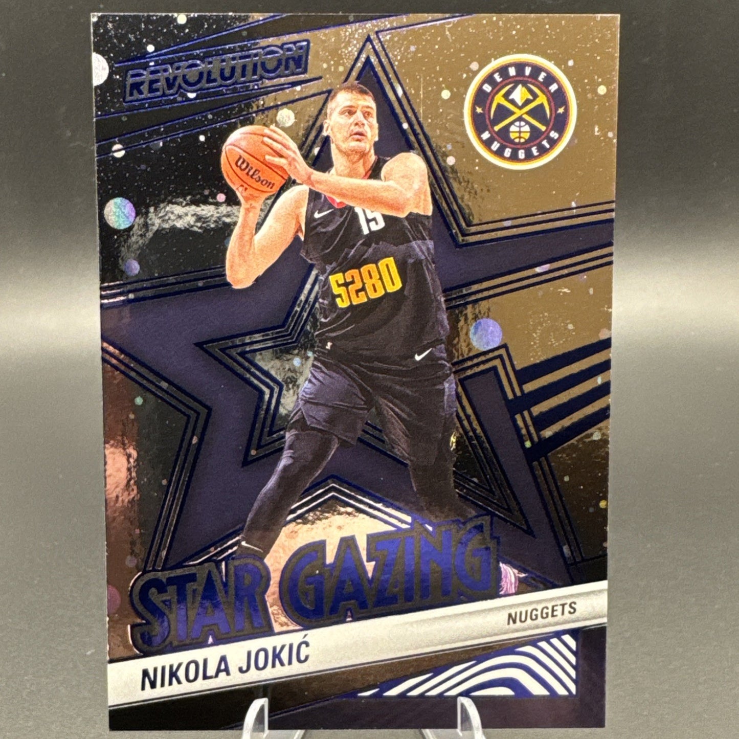 2024-25 Panini Revolution Star Gazing Nikola Jokić #7 Blue Astro 124/285