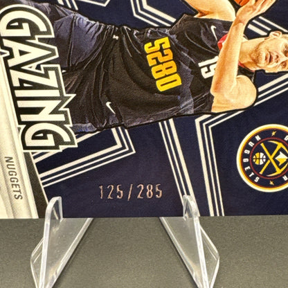 2024-25 Panini Revolution Star Gazing Nikola Jokić #7 Blue Astro 124/285