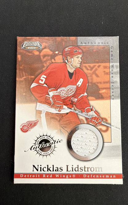 2002-03 Pacific Exclusive - Game-Worn Jerseys Nicklas Lidstrom #8 (MEM)