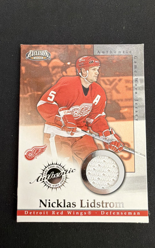 2002-03 Pacific Exclusive - Game-Worn Jerseys Nicklas Lidstrom #8 (MEM)