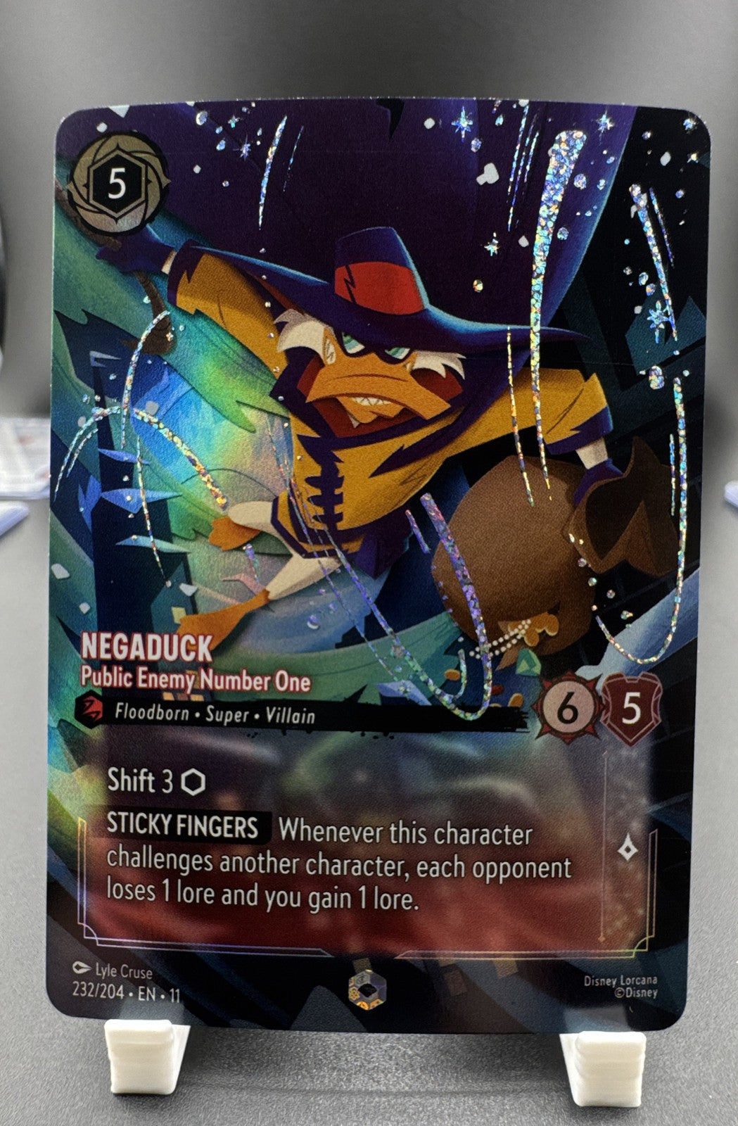 Negaduck - Public Enemy Number One (Enchanted) 232/204 Winterspell Holo