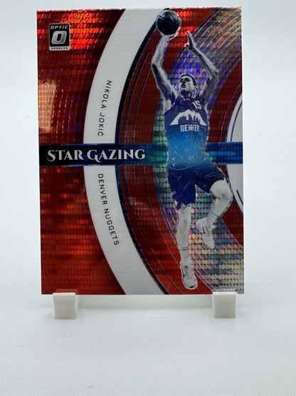 2021-22 Donruss Optic #5 Nikola Jokic Star Gazing Red Pulsar Denver Nuggets