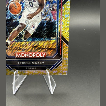 2022-23 Panini Prizm Monopoly Tyrese Maxey #69 Gold Money Shimmer Prizm