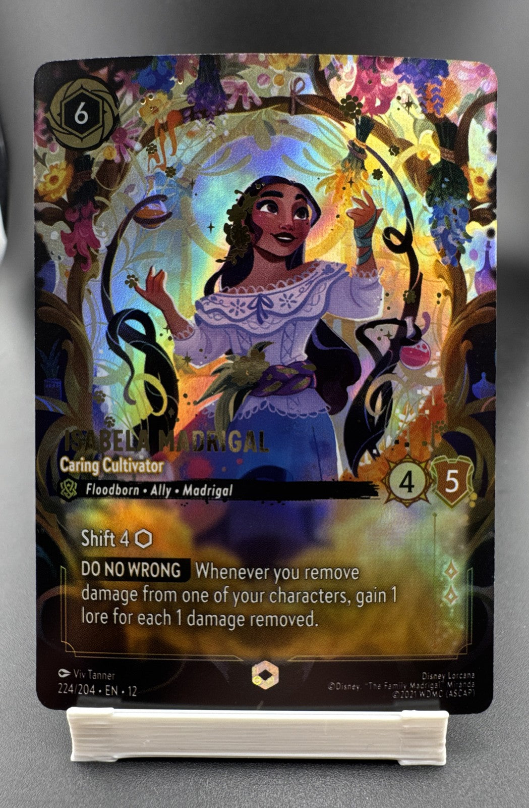 Isabela Madrigal - Caring Cultivator (Enchanted) 224/204 Wilds Unknown Holo