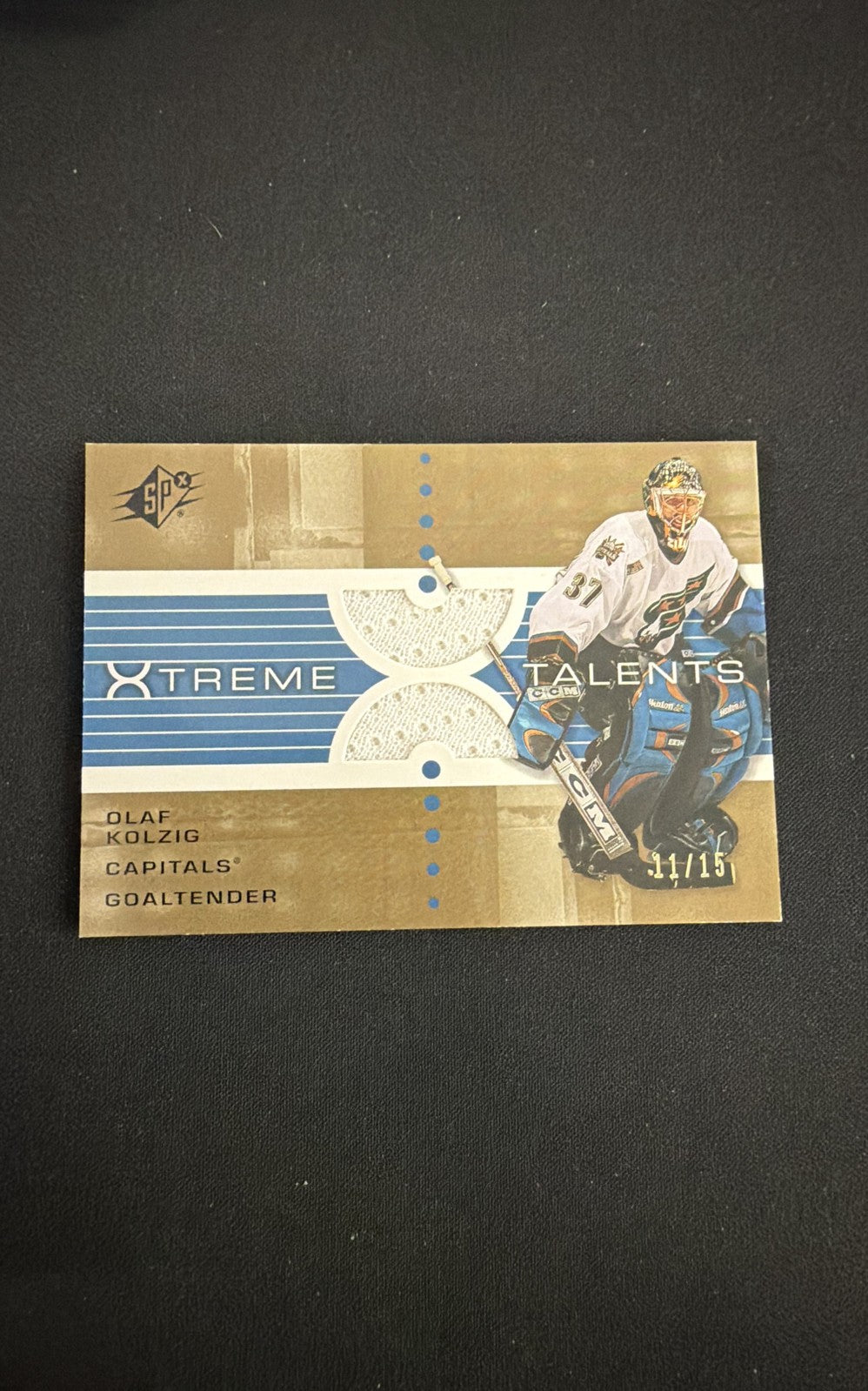 2002-03 SPx - Xtreme Talents Olaf Kolzig #X-OK Gold /15 (MEM)