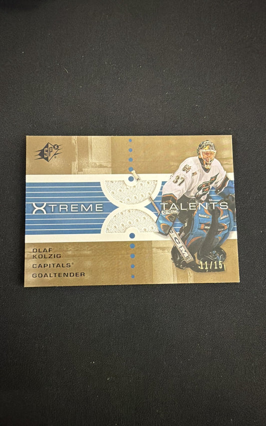 2002-03 SPx - Xtreme Talents Olaf Kolzig #X-OK Gold /15 (MEM)