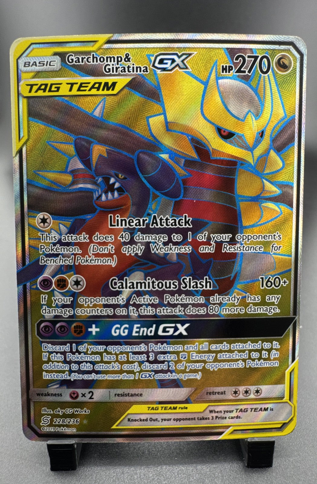 Garchomp & Giratina GX (Full Art) 228/236 Sm-Unified Minds Holo