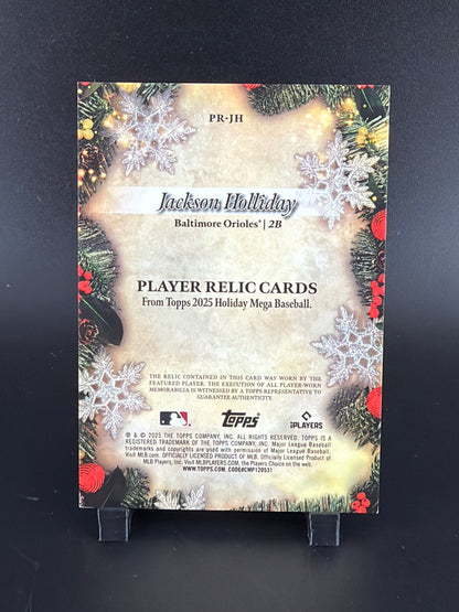 2025 Topps Holiday Jackson Holliday #PR-JH /299 Player-Worn Memorabilia Relic